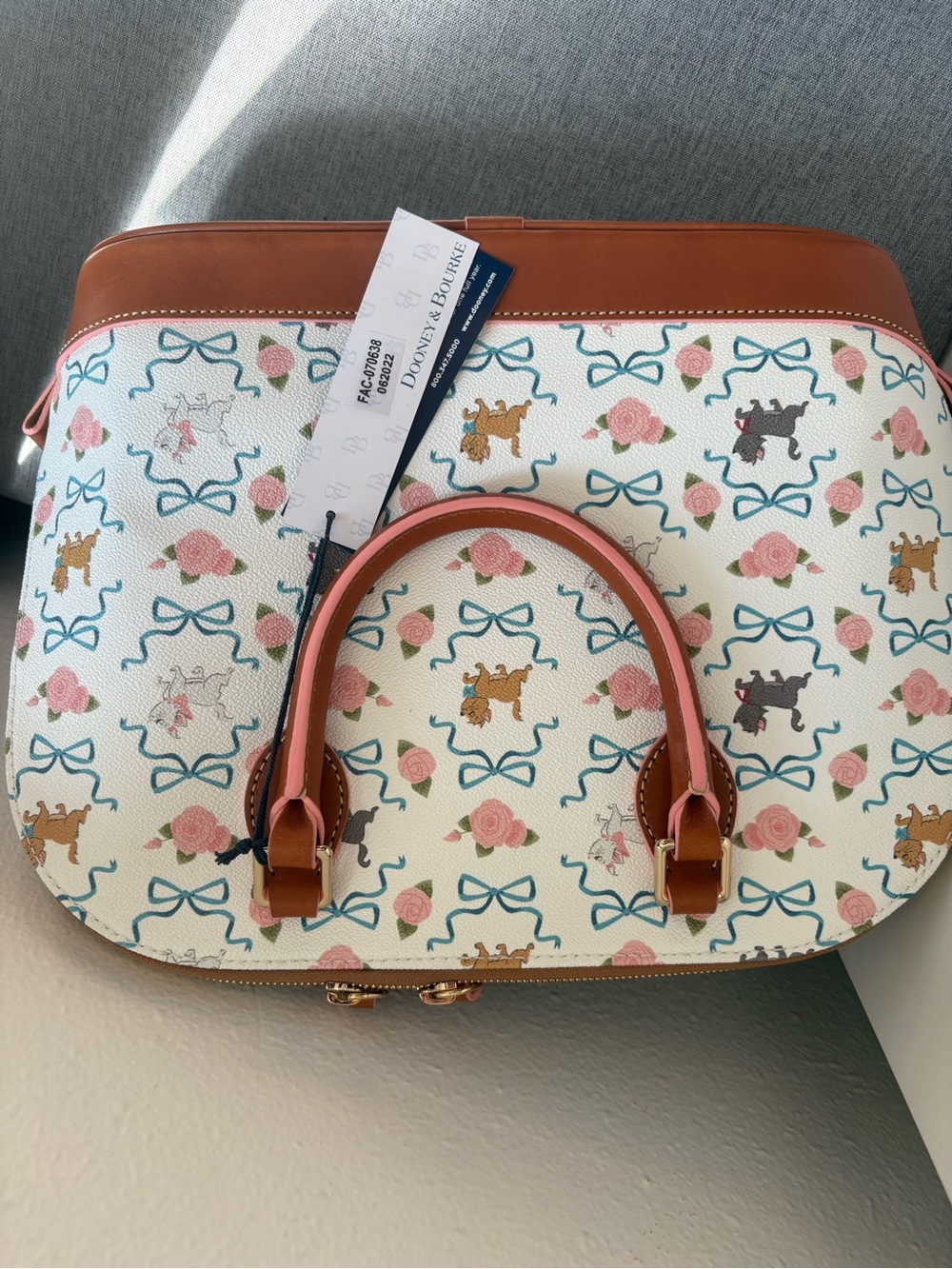 Dooney & Bourke White Satchel with Brown Trim and Pink Accents - Picture 2 of 4